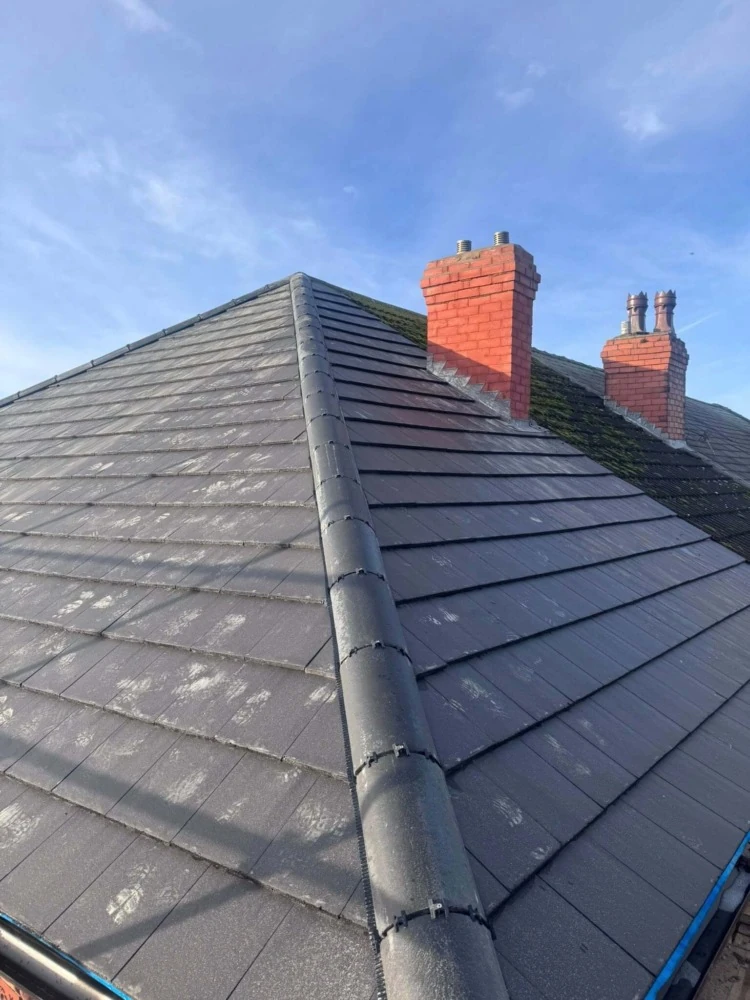 Roofers in Weston-super-Mare working on a pitched roof