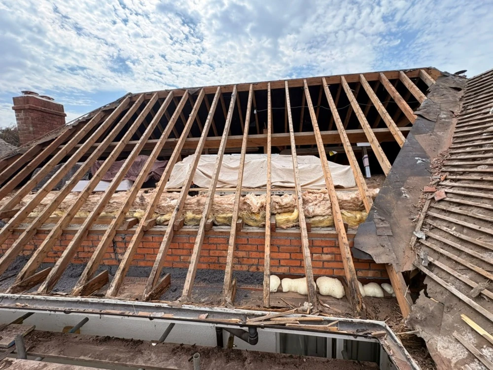 Roof completely stripped down to rafters