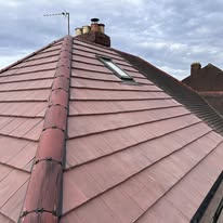 Red tile roofing project by MH Roofing Solutions UK showcasing expert craftsmanship