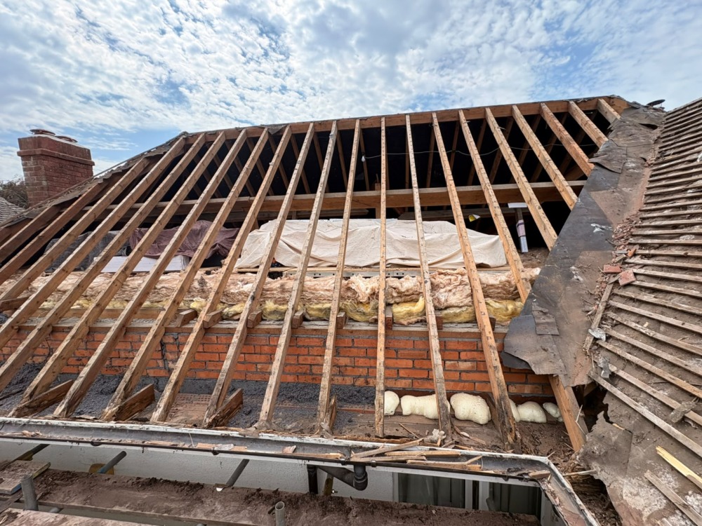 Roof completely stripped down to rafters